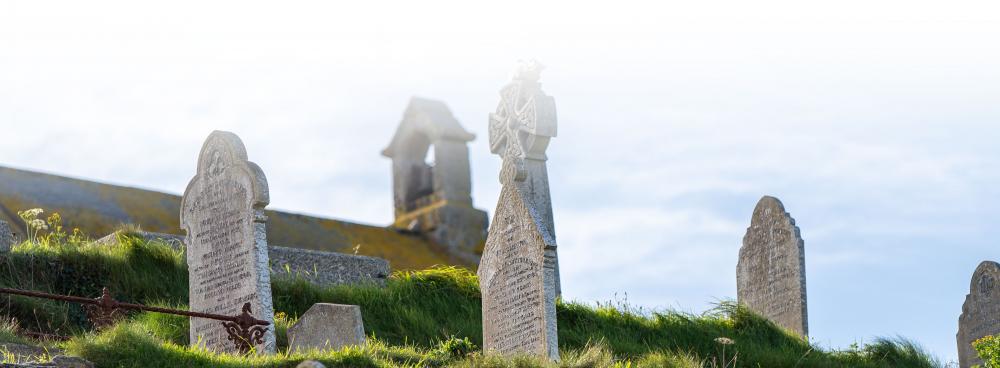 gravestones and bell tower